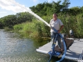 Dredging with hydraulic driven pump